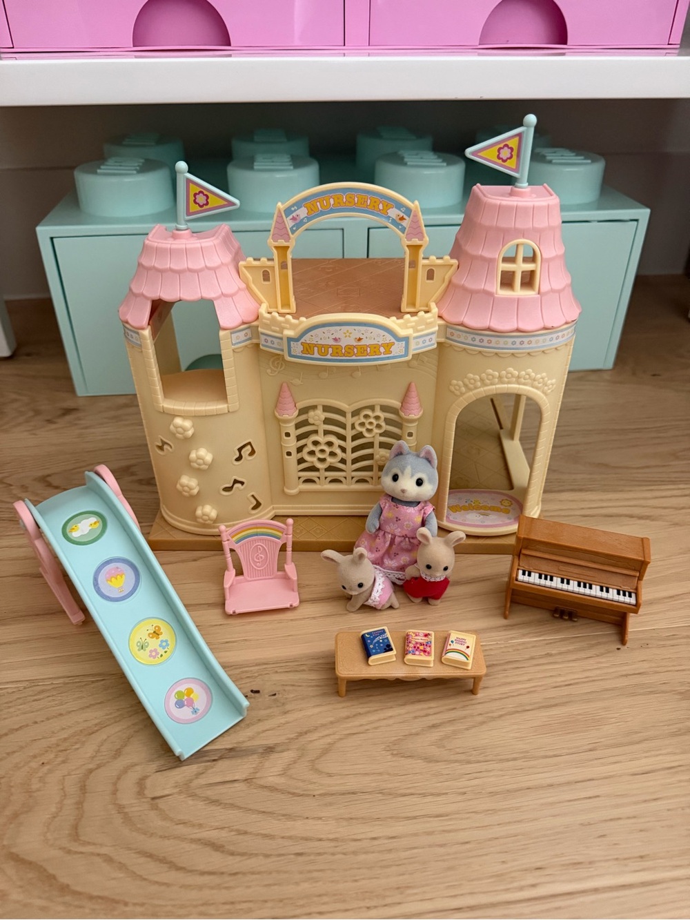 Calico Critters Baby Castle Nursery Playset plus three Critter Figurines